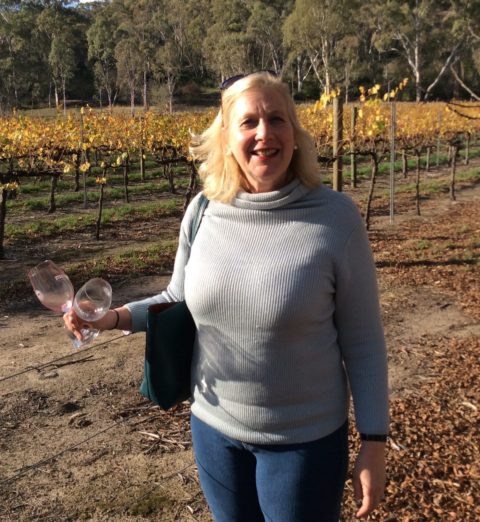 Your host Alicia in a vineyard